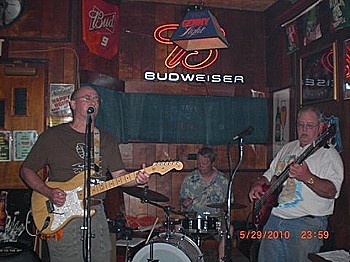 ROCK, PAPER, SCISSORS (left to right, Danny, Jim Sturdevant, Doug Hoffman) crank out surf, spy, psychedelic blues, and originals at Andy's, Warren, PA, May 2010.
